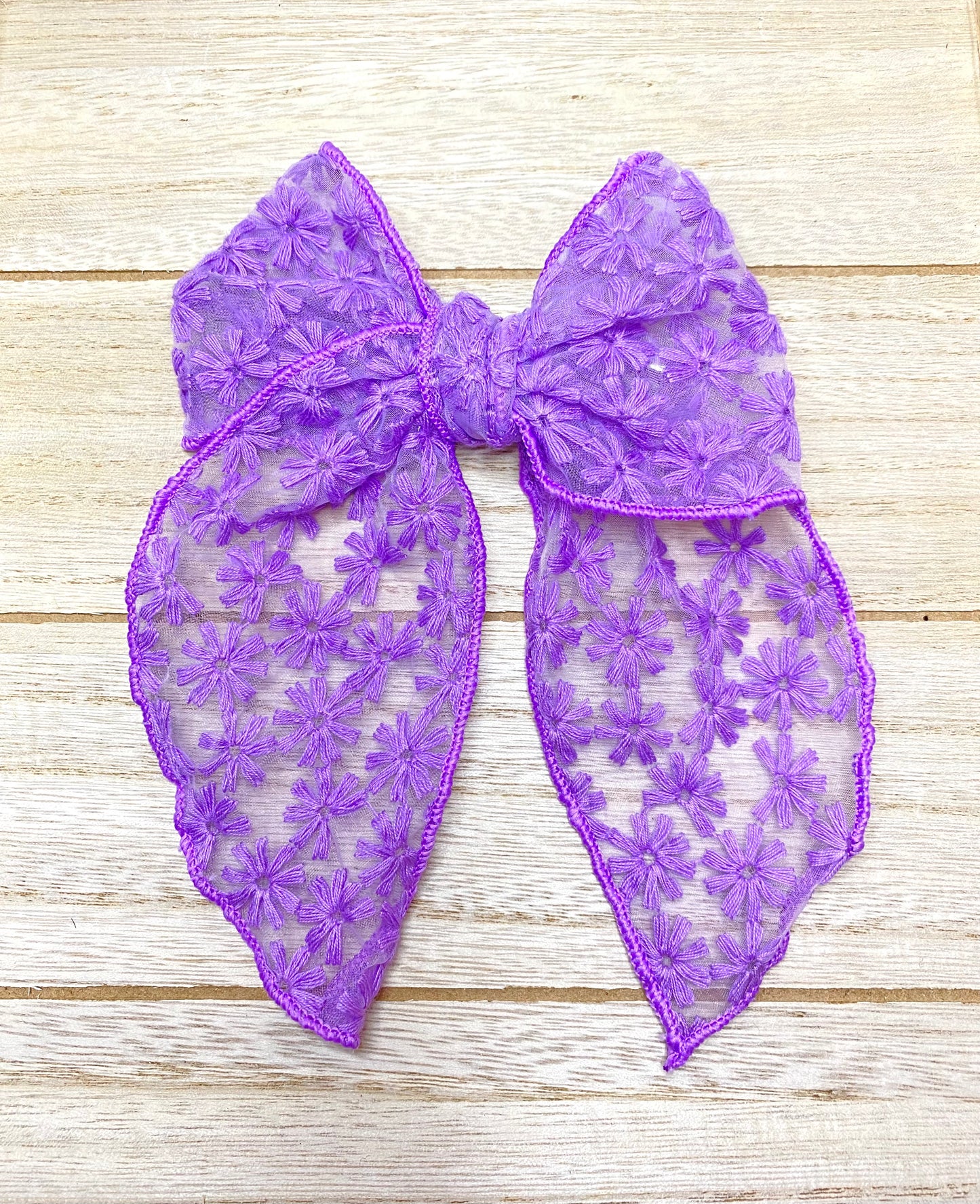 Purple hand tie bow