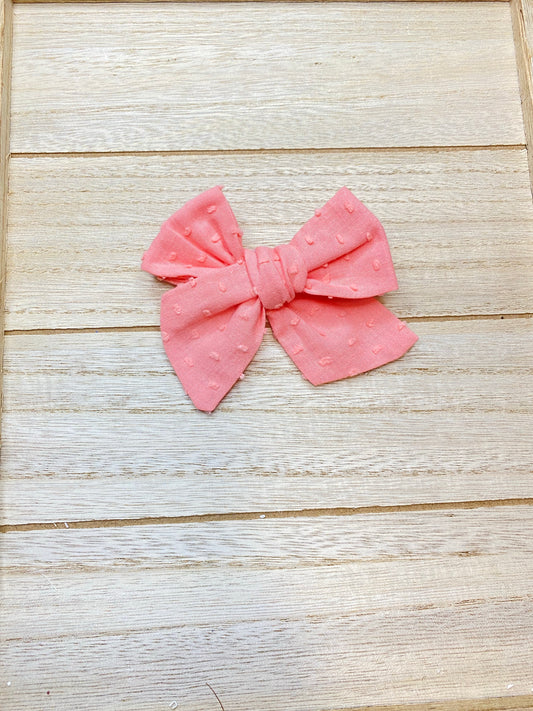 Coral Swiss dot bow
